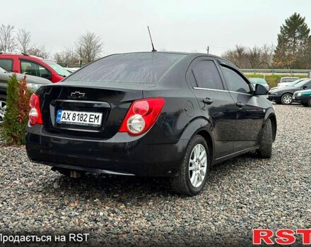 Черный Шевроле Авео, объемом двигателя 1.6 л и пробегом 191 тыс. км за 5800 $, фото 1 на Automoto.ua