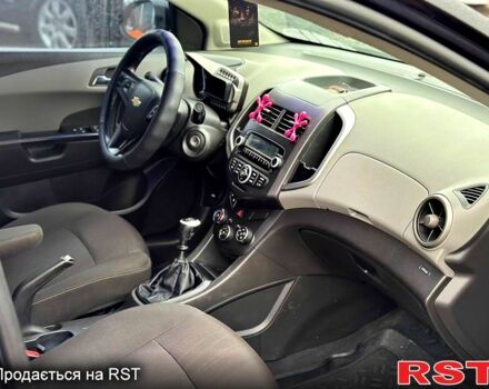 Черный Шевроле Авео, объемом двигателя 1.6 л и пробегом 191 тыс. км за 5800 $, фото 6 на Automoto.ua