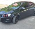 Черный Шевроле Авео, объемом двигателя 1.4 л и пробегом 156 тыс. км за 6128 $, фото 1 на Automoto.ua