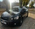 Черный Шевроле Авео, объемом двигателя 1.4 л и пробегом 200 тыс. км за 6300 $, фото 1 на Automoto.ua