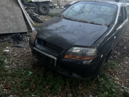 Черный Шевроле Авео, объемом двигателя 1.5 л и пробегом 200 тыс. км за 639 $, фото 1 на Automoto.ua