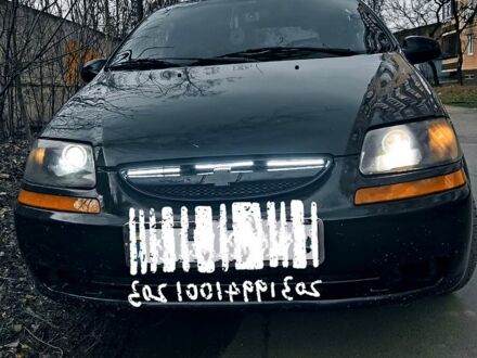 Черный Шевроле Авео, объемом двигателя 15 л и пробегом 250 тыс. км за 1700 $, фото 1 на Automoto.ua
