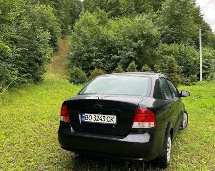Черный Шевроле Авео, объемом двигателя 1.5 л и пробегом 245 тыс. км за 2600 $, фото 1 на Automoto.ua