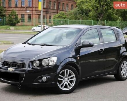 Черный Шевроле Авео, объемом двигателя 1.6 л и пробегом 207 тыс. км за 4900 $, фото 1 на Automoto.ua