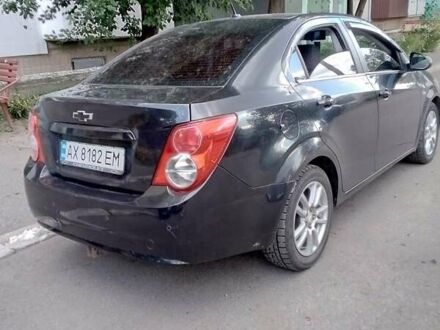 Черный Шевроле Авео, объемом двигателя 1.6 л и пробегом 180 тыс. км за 5000 $, фото 1 на Automoto.ua