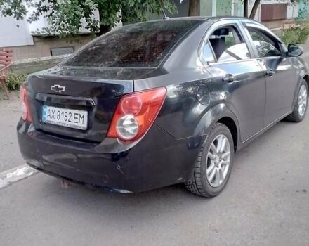 Черный Шевроле Авео, объемом двигателя 1.6 л и пробегом 180 тыс. км за 5000 $, фото 1 на Automoto.ua