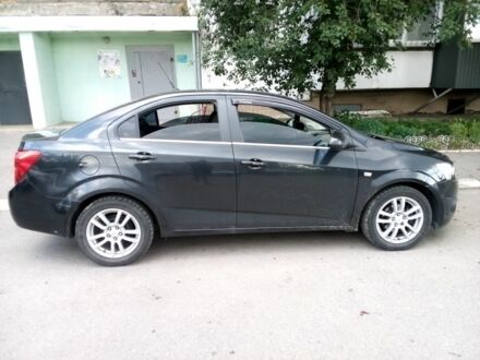Черный Шевроле Авео, объемом двигателя 1.6 л и пробегом 180 тыс. км за 5000 $, фото 1 на Automoto.ua