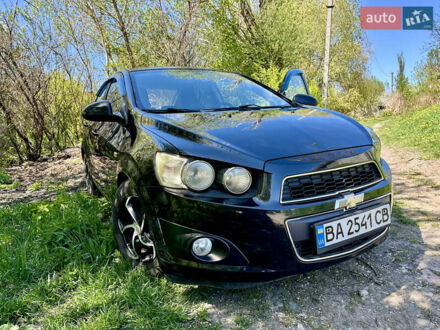 Черный Шевроле Авео, объемом двигателя 1.6 л и пробегом 95 тыс. км за 6800 $, фото 1 на Automoto.ua