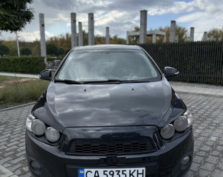 Черный Шевроле Авео, объемом двигателя 1.4 л и пробегом 210 тыс. км за 4500 $, фото 1 на Automoto.ua