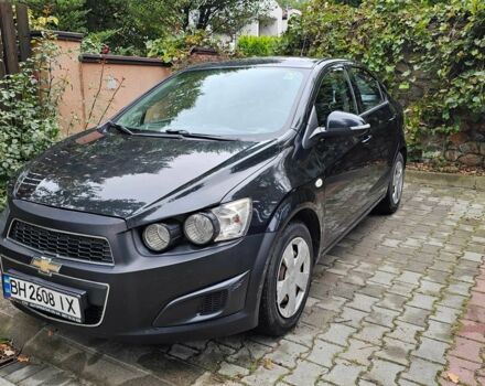 Черный Шевроле Авео, объемом двигателя 1.4 л и пробегом 98 тыс. км за 5500 $, фото 1 на Automoto.ua