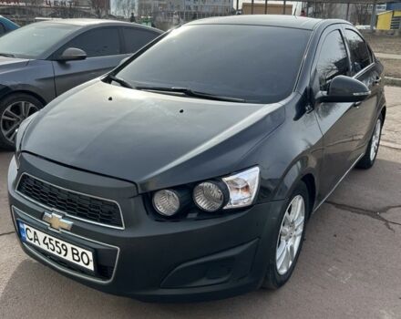 Черный Шевроле Авео, объемом двигателя 1.4 л и пробегом 172 тыс. км за 5500 $, фото 1 на Automoto.ua
