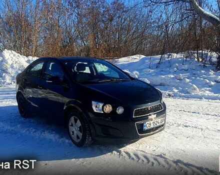 Черный Шевроле Авео, объемом двигателя 1.4 л и пробегом 13000 тыс. км за 5000 $, фото 1 на Automoto.ua