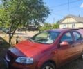 Червоний Шевроле Авео, об'ємом двигуна 1.5 л та пробігом 150 тис. км за 1573 $, фото 1 на Automoto.ua