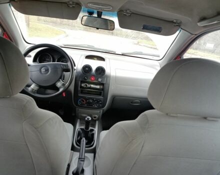 Красный Шевроле Авео, объемом двигателя 1.2 л и пробегом 305 тыс. км за 1600 $, фото 1 на Automoto.ua