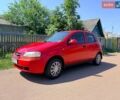 Червоний Шевроле Авео, об'ємом двигуна 1.2 л та пробігом 314 тис. км за 1750 $, фото 1 на Automoto.ua