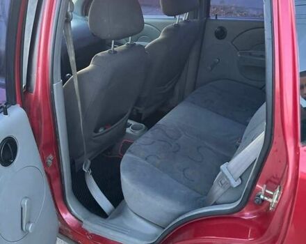 Красный Шевроле Авео, объемом двигателя 1.5 л и пробегом 306 тыс. км за 2000 $, фото 7 на Automoto.ua