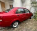 Красный Шевроле Авео, объемом двигателя 1.6 л и пробегом 230 тыс. км за 2300 $, фото 2 на Automoto.ua