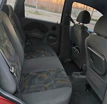 Красный Шевроле Авео, объемом двигателя 1.5 л и пробегом 281 тыс. км за 2900 $, фото 2 на Automoto.ua