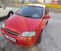 Красный Шевроле Авео, объемом двигателя 1.5 л и пробегом 327 тыс. км за 2900 $, фото 1 на Automoto.ua