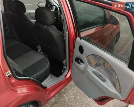Красный Шевроле Авео, объемом двигателя 1.5 л и пробегом 275 тыс. км за 3700 $, фото 6 на Automoto.ua
