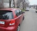 Красный Шевроле Авео, объемом двигателя 1.5 л и пробегом 254 тыс. км за 3000 $, фото 1 на Automoto.ua