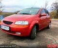 Красный Шевроле Авео, объемом двигателя 1.5 л и пробегом 275 тыс. км за 3700 $, фото 1 на Automoto.ua