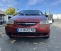 Красный Шевроле Авео, объемом двигателя 1.5 л и пробегом 382 тыс. км за 1705 $, фото 1 на Automoto.ua