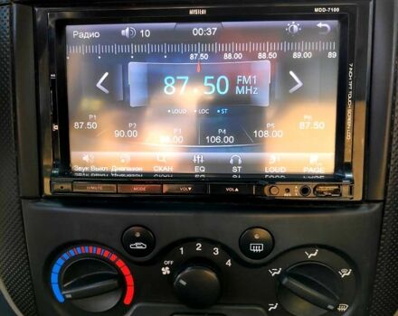 Красный Шевроле Авео, объемом двигателя 1.5 л и пробегом 210 тыс. км за 2300 $, фото 5 на Automoto.ua