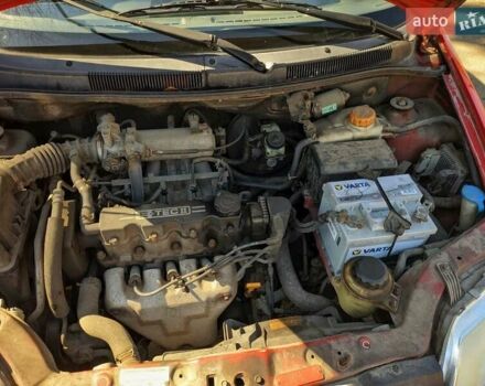Красный Шевроле Авео, объемом двигателя 1.5 л и пробегом 190 тыс. км за 2800 $, фото 10 на Automoto.ua