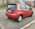 Красный Шевроле Авео, объемом двигателя 1.5 л и пробегом 275 тыс. км за 3700 $, фото 1 на Automoto.ua