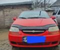 Красный Шевроле Авео, объемом двигателя 1.5 л и пробегом 180 тыс. км за 2100 $, фото 2 на Automoto.ua