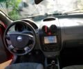 Красный Шевроле Авео, объемом двигателя 1.5 л и пробегом 210 тыс. км за 2300 $, фото 4 на Automoto.ua