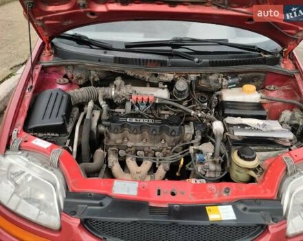 Красный Шевроле Авео, объемом двигателя 1.5 л и пробегом 275 тыс. км за 3700 $, фото 10 на Automoto.ua