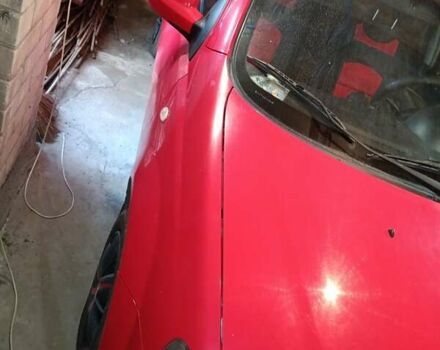 Красный Шевроле Авео, объемом двигателя 1.5 л и пробегом 135 тыс. км за 3650 $, фото 2 на Automoto.ua