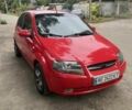 Красный Шевроле Авео, объемом двигателя 1.5 л и пробегом 250 тыс. км за 3300 $, фото 1 на Automoto.ua