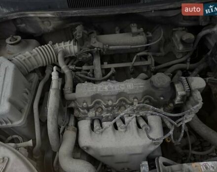 Красный Шевроле Авео, объемом двигателя 1.5 л и пробегом 290 тыс. км за 1680 $, фото 32 на Automoto.ua