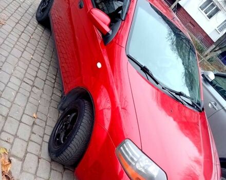 Красный Шевроле Авео, объемом двигателя 1.5 л и пробегом 420 тыс. км за 3350 $, фото 2 на Automoto.ua