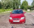 Красный Шевроле Авео, объемом двигателя 1.5 л и пробегом 316 тыс. км за 2300 $, фото 1 на Automoto.ua