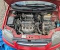 Красный Шевроле Авео, объемом двигателя 1.5 л и пробегом 150 тыс. км за 1300 $, фото 1 на Automoto.ua