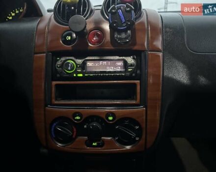 Красный Шевроле Авео, объемом двигателя 1.5 л и пробегом 290 тыс. км за 1680 $, фото 27 на Automoto.ua