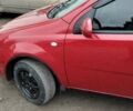Красный Шевроле Авео, объемом двигателя 1.5 л и пробегом 280 тыс. км за 3400 $, фото 5 на Automoto.ua