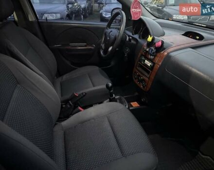 Красный Шевроле Авео, объемом двигателя 1.5 л и пробегом 290 тыс. км за 1680 $, фото 26 на Automoto.ua