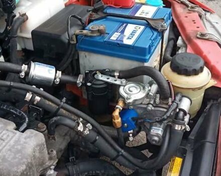 Красный Шевроле Авео, объемом двигателя 1.1 л и пробегом 111 тыс. км за 4000 $, фото 14 на Automoto.ua