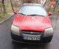 Красный Шевроле Авео, объемом двигателя 1.5 л и пробегом 205 тыс. км за 2499 $, фото 1 на Automoto.ua