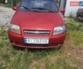 Красный Шевроле Авео, объемом двигателя 1.5 л и пробегом 251 тыс. км за 2600 $, фото 1 на Automoto.ua
