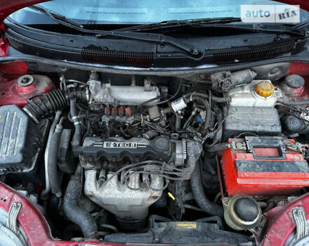 Красный Шевроле Авео, объемом двигателя 1.5 л и пробегом 125 тыс. км за 4000 $, фото 27 на Automoto.ua
