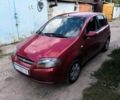 Красный Шевроле Авео, объемом двигателя 1.5 л и пробегом 235 тыс. км за 3352 $, фото 1 на Automoto.ua
