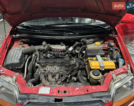 Красный Шевроле Авео, объемом двигателя 1.5 л и пробегом 304 тыс. км за 2500 $, фото 9 на Automoto.ua
