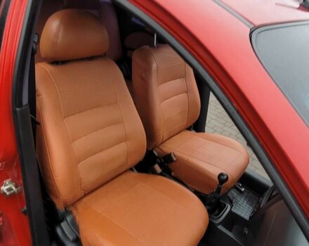 Красный Шевроле Авео, объемом двигателя 1.5 л и пробегом 220 тыс. км за 3650 $, фото 2 на Automoto.ua