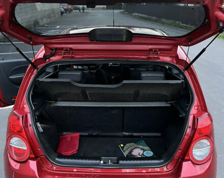 Красный Шевроле Авео, объемом двигателя 1.5 л и пробегом 143 тыс. км за 3800 $, фото 10 на Automoto.ua